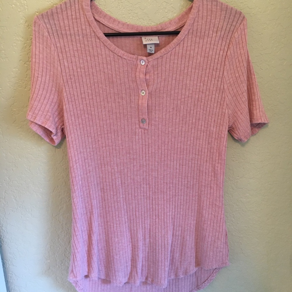 A new day light pink top